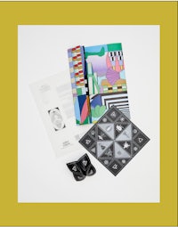 a set of books and other items on a white background